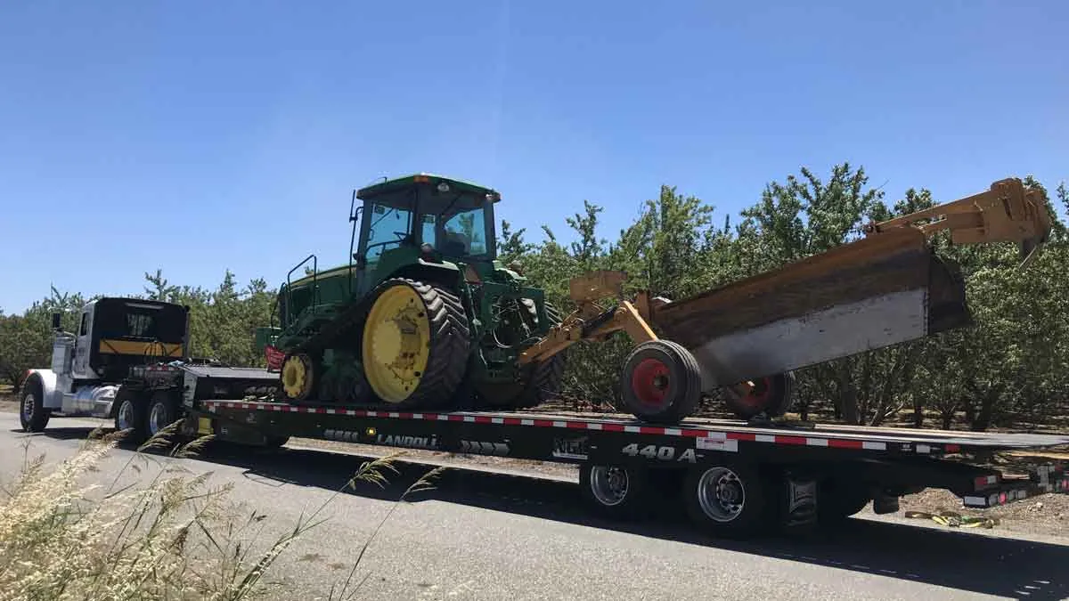 Tractor on a Bambauer lowboy trailer